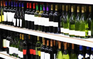 Photo of shelves with bottles of wine