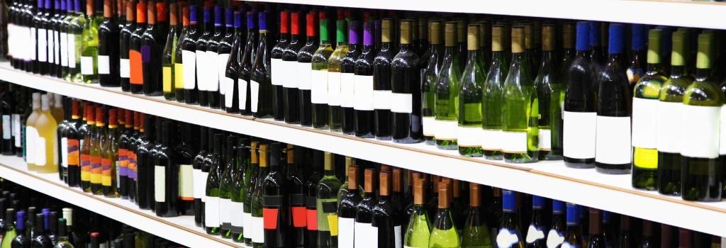 Photo of shelves with bottles of wine
