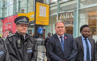 The Mayor joned by Councillor Kolade, and the Borough Commander of the Metropolitan Police and two officers