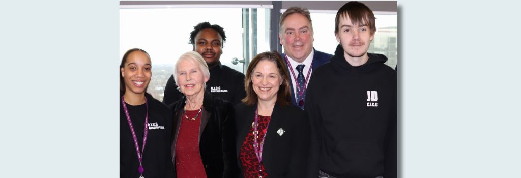 Mayor Perry and Cllr Maria Gatland with staff members and young people