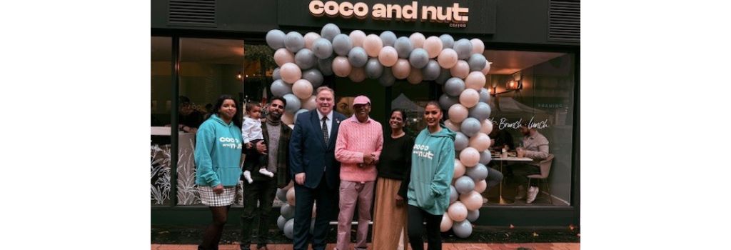 Executive Mayor Jason Perry with staff from Coco and Nut on its opening day.
