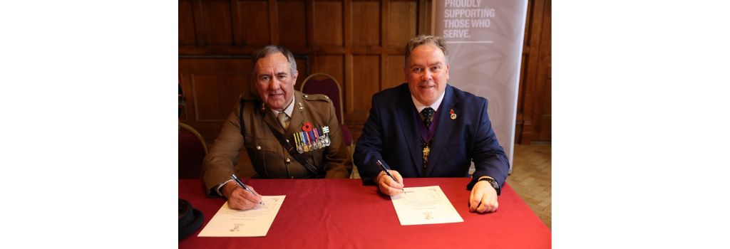 Mayor Perry and Major Church signed the Armed Forces Covenant.