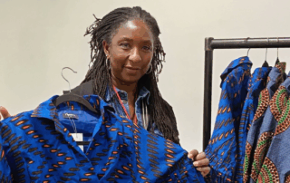 Flora Oworu, of Flakies Fashion with clothes she has designed on display at Made By Croydon.