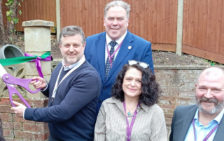 Mayor Perry and Council staff together with staff from St Christopher's opening the care home.