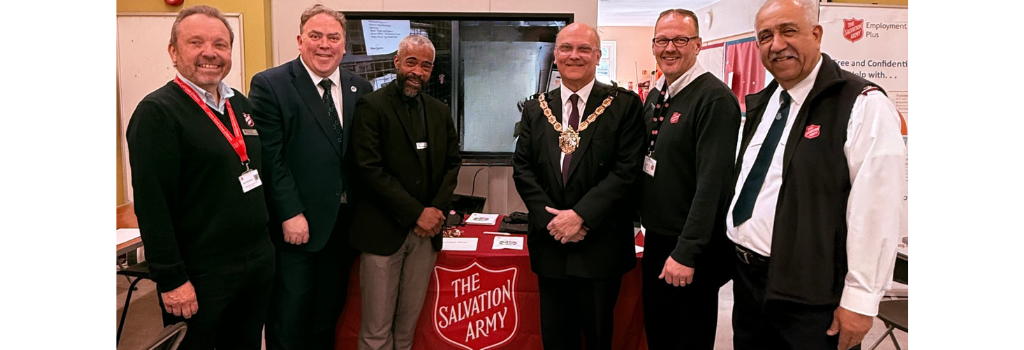 Mayor Perry and the Civic Mayor with members of the Salvation Army.
