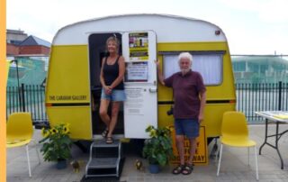 Jan and Chris with The Caravan Gallery