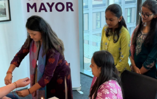 Mayor Perry taking part in the Hindu festival of Raksha Bandhan.